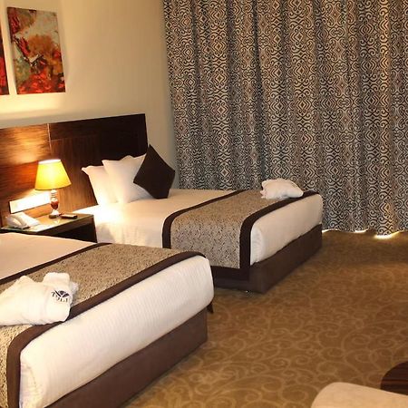 Tolip El Forsan Hotel Ismailía Exterior foto A room at the hotel